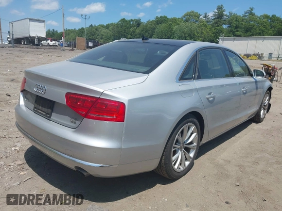 2011 Audi A8 with VIN WAURVAFD4BN019033, listed as a IAAI auction lot 42532173 with 97,486 mi miles and . Bid and sale history available at DreamBid. Image 4.