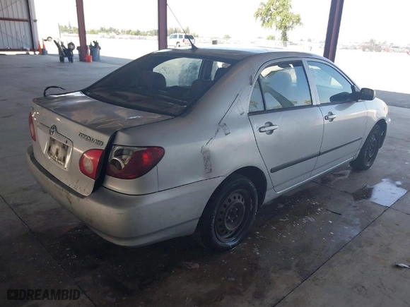 2008 Toyota Corolla CE with VIN 1NXBR32E98Z981714, listed as a IAAI auction lot 41901798 with 299,999 mi miles. Bid and sale history available at carsss.com. Image 4.