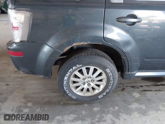 2008 Mercury Mariner Premier with VIN 4M2CU97198KJ30843, listed as a IAAI auction lot 42579794 with 109,983 mi miles and . Bid and sale history available at DreamBid. Image 6.