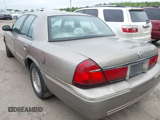2001 Mercury Grand Marquis LS with VIN 2MEFM75W71X643239, listed as a IAAI auction lot 42048113 with 195,441 mi miles and . Bid and sale history available at DreamBid. Image 3.