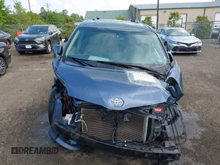 2016 Toyota Sienna XLE z VIN 5TDYK3DC2GS739042, wystawiony jako IAAI lot #42163983 z przebiegiem 98 842 mil mil oraz . Historia ofert i sprzedaży dostępna na DreamBid. Obrazek 13.