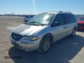 1999 Chrysler Town & Country LXi with VIN 1C4GP54L9XB872347, listed as a IAAI auction lot 41611666 with 224,817 mi miles. Bid and sale history available at carsss.com. Image 2.