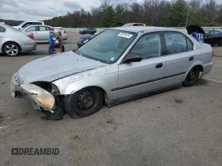 1998 Honda Civic LX with VIN 2HGEJ6673WH553872, listed as a Copart auction lot 73574674 with 180,070 mi miles and Salvage Title. Bid and sale history available at carsss.com. Image 1.
