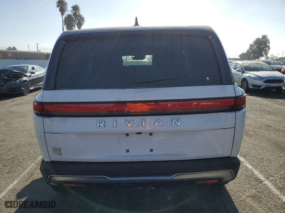 2024 Rivian R1S Adventure with VIN 7PDSGABA6RN043721, listed as a Copart auction lot 64231094 with 0 mi miles and Salvage Title. Bid and sale history available at carsss.com. Image 6.