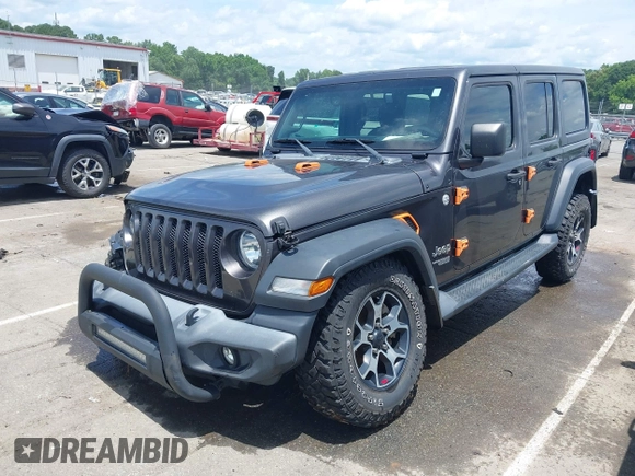 2019 Jeep Wrangler Unlimited Sport S with VIN 1C4HJXDN4KW577273, listed as a IAAI auction lot 42435847 with 69,403 mi miles and . Bid and sale history available at DreamBid. Image 2.
