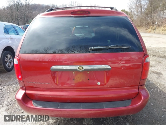 2006 Chrysler Town & Country with VIN 1A4GP45RX6B584391, listed as a IAAI auction lot 41882597 with 160,886 mi miles and . Bid and sale history available at DreamBid. Image 16.