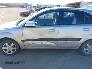 2009 Kia Rio LX with VIN KNADE243596530314, listed as a IAAI auction lot 41681050 with 114,831 mi miles. Bid and sale history available at carsss.com. Image 14.