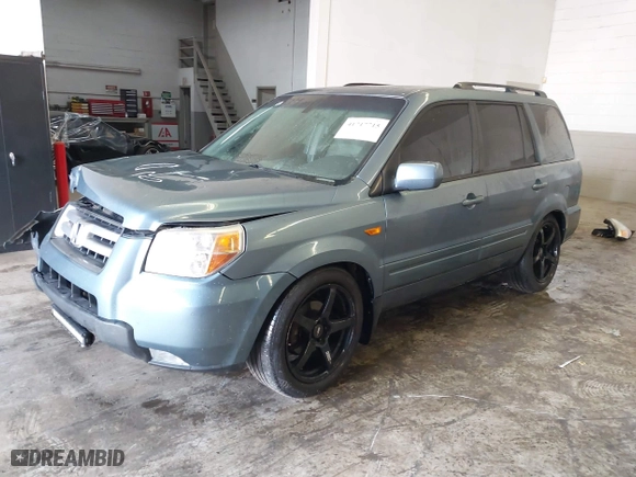 2007 Honda Pilot EX-L with VIN 2HKYF18767H514926, listed as a IAAI auction lot 41717715 with 129,927 mi miles. Bid and sale history available at carsss.com. Image 18.