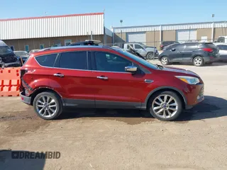 2016 Ford Escape SE z VIN 1FMCU0G79GUB36498, wystawiony jako IAAI lot #42216144 z przebiegiem 179 230 mil mil oraz . Historia ofert i sprzedaży dostępna na DreamBid. Obrazek 14.