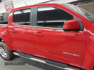 2019 GMC Canyon 2WD SLE z VIN 1GTG5CENXK1137028, wystawiony jako IAAI lot #42374821 z przebiegiem 91 228 mil mil oraz . Historia ofert i sprzedaży dostępna na DreamBid. Obrazek 13.