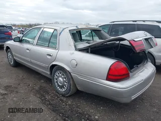 2004 Mercury Grand Marquis GS with VIN 2MEFM74W84X634345, listed as a IAAI auction lot 41920110 with 97,749 mi miles and . Bid and sale history available at DreamBid. Image 3.