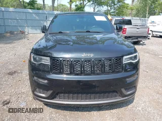 2019 Jeep Grand Cherokee Limited z VIN 1C4RJFBG6KC696561, wystawiony jako IAAI lot #42497444 z przebiegiem 50 769 mil mil oraz . Historia ofert i sprzedaży dostępna na DreamBid. Obrazek 12.