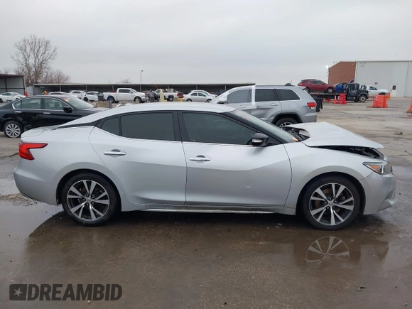 2017 Nissan Maxima S with VIN 1N4AA6AP0HC413164, listed as a IAAI auction lot 41497747 with 225,799 mi miles and . Bid and sale history available at DreamBid. Image 14.