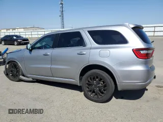 2016 Dodge Durango SXT with VIN 1C4RDHAG2GC422818, listed as a Copart auction lot 56157875 with 131,423 mi miles and Salvage title. Bid and sale history available at DreamBid. Image 2.