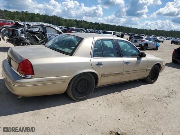 2000 Ford Crown Victoria with VIN 2FAFP73W0YX127395, listed as a Copart auction lot 72442494 with 123,999 mi miles and Salvage Title. Bid and sale history available at carsss.com. Image 3.