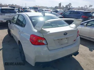 2019 Subaru WRX STI with VIN JF1VA2R60K9819293, listed as a IAAI auction lot 41758745 with 42,101 mi miles and . Bid and sale history available at DreamBid. Image 3.