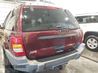 2000 Jeep Grand Cherokee Laredo z VIN 1J4GW48N8YC151600, wystawiony jako IAAI lot #42178535 z przebiegiem 71 207 mil mil oraz . Historia ofert i sprzedaży dostępna na DreamBid. Obrazek 6.