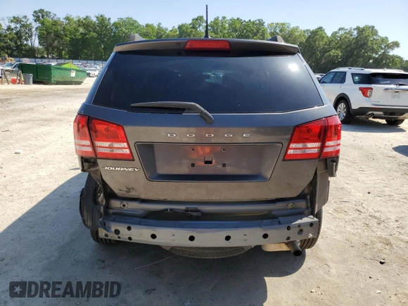 2017 Dodge Journey SE with VIN 3C4PDCAB6HT621987, listed as a Copart auction lot 52559305 with 169,468 mi miles and Salvage Title. Bid and sale history available at DreamBid. Image 6.
