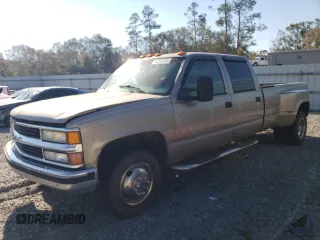2000 Chevrolet Silverado 3500 z VIN 1GCHC33J3YF407092, wystawiony jako Copart lot #82295374 z przebiegiem 233 363 mil mil oraz Szkoda całkowita • Salvage title. Historia ofert i sprzedaży dostępna na DreamBid. Obrazek 1.