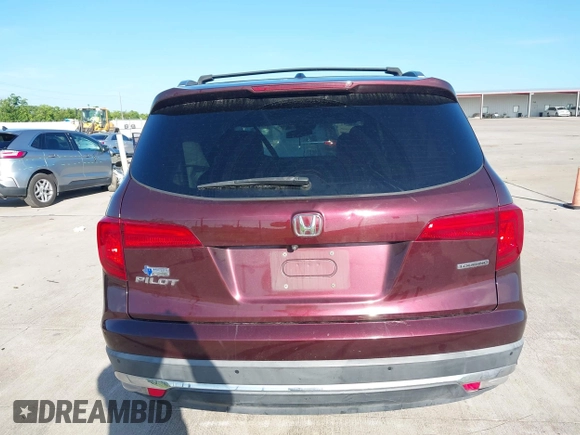 2017 Honda Pilot Touring with VIN 5FNYF5H96HB038413, listed as a IAAI auction lot 42594065 with 130,501 mi miles and . Bid and sale history available at DreamBid. Image 16.