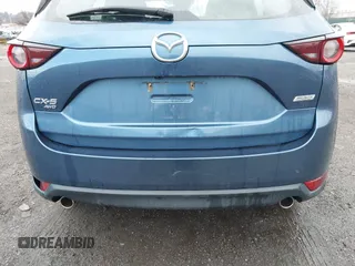 2019 Mazda CX-5 Sport with VIN JM3KFBBM5K0668678, listed as a IAAI auction lot 41811146 with 102,634 mi miles and . Bid and sale history available at DreamBid. Image 6.