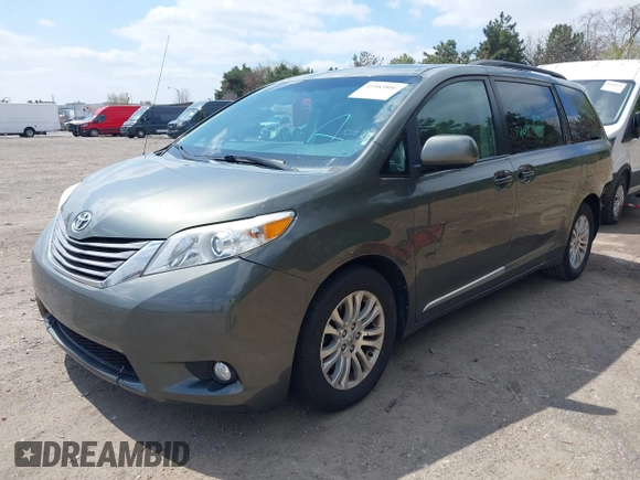 2012 Toyota Sienna XLE AAS z VIN 5TDYK3DC0CS221618, wystawiony jako IAAI lot #41983806 z przebiegiem 200 851 mil mil oraz . Historia ofert i sprzedaży dostępna na DreamBid. Obrazek 2.