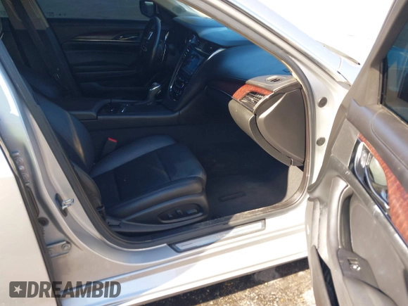 2017 Cadillac CTS Luxury RWD with VIN 1G6AR5SS4H0186842, listed as a IAAI auction lot 40931575 with 166,377 mi miles and . Bid and sale history available at DreamBid. Image 5.