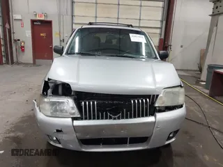 2007 Mercury Mariner Premier z VIN 4M2CU97197KJ06878, wystawiony jako IAAI lot #41033843 z przebiegiem 139 492 mil mil oraz . Historia ofert i sprzedaży dostępna na DreamBid. Obrazek 12.