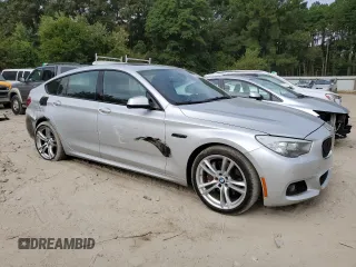 2013 BMW 5 Series GT 535i xDrive with VIN WBASP2C51DC339651, listed as a Copart auction lot 70028724 with 98,674 mi miles and Salvage Title. Bid and sale history available at carsss.com. Image 4.