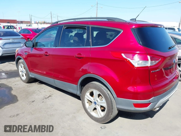 2015 Ford Escape SE with VIN 1FMCU0GX3FUC80207, listed as a IAAI auction lot 41665897 with 153,891 mi miles. Bid and sale history available at carsss.com. Image 3.