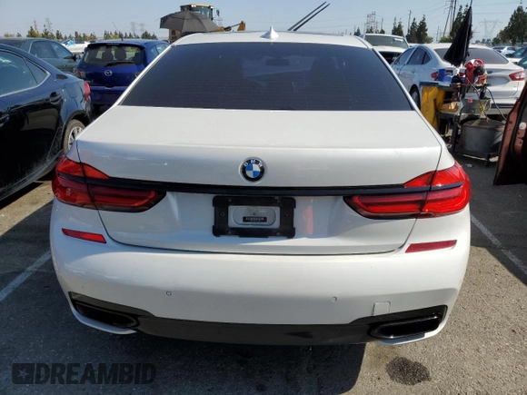 2018 BMW 7 Series 740i with VIN WBA7E2C5XJB214886, listed as a Copart auction lot 57833143 with 39,975 mi miles. Bid and sale history available at carsss.com. Image 6.