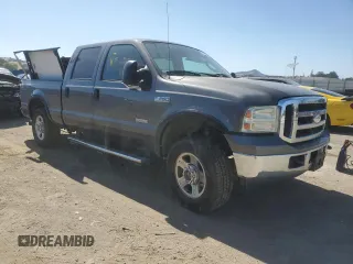 2007 Ford F-250 XL with VIN 1FTSW21P57EA59900, listed as a Copart auction lot 58787085 with 216,385 mi miles and Salvage title. Bid and sale history available at DreamBid. Image 4.