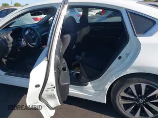 2018 Nissan Altima 2.5 S with VIN 1N4AL3AP8JC254733, listed as a IAAI auction lot 40212001 with 148,347 mi miles. Bid and sale history available at carsss.com. Image 8.