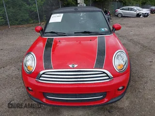 2011 MINI Convertible with VIN WMWZN3C59BTZ89447, listed as a IAAI auction lot 42313009 with 62,009 mi miles and . Bid and sale history available at DreamBid. Image 13.