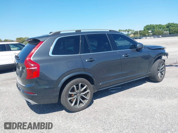 2017 Volvo XC90 Momentum with VIN YV4A22PK6H1149002, listed as a IAAI auction lot 41405845 with 105,292 mi miles. Bid and sale history available at carsss.com. Image 4.