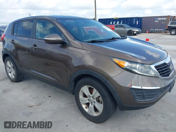 2013 Kia Sportage LX with VIN KNDPB3A28D7375304, listed as a IAAI auction lot 42566081 with 17,890 mi miles and . Bid and sale history available at DreamBid. Image 1.