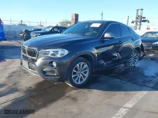 2019 BMW X6 sDrive35i with VIN 5UXKU0C57K0S97581, listed as a IAAI auction lot 41322568 with 76,635 mi miles. Bid and sale history available at carsss.com. Image 17.