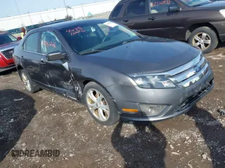 2012 Ford Fusion SE z VIN 3FAHP0HG9CR170500, wystawiony jako IAAI lot #42351226 z przebiegiem 119 206 mil mil oraz . Historia ofert i sprzedaży dostępna na DreamBid. Obrazek 1.