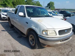 1997 Ford F-150 with VIN 1FTDX1729VKD58686, listed as a IAAI auction lot 42686935 with 326,457 mi miles and . Bid and sale history available at DreamBid. Image 1.