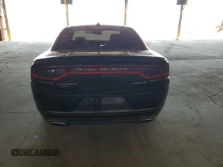 2015 Dodge Charger SXT with VIN 2C3CDXJG9FH748809, listed as a Copart auction lot 61682335 with 128,252 mi miles and Salvage title. Bid and sale history available at DreamBid. Image 6.