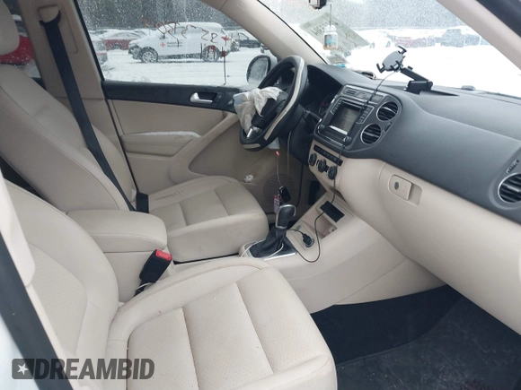 2016 Volkswagen Tiguan S with VIN WVGBV7AX2GW550558, listed as a IAAI auction lot 41553304 with 100,864 mi miles and . Bid and sale history available at DreamBid. Image 5.
