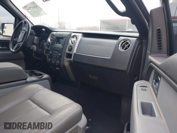 2014 Ford F-150 XL with VIN 1FTFW1CF9EKD01702, listed as a IAAI auction lot 41447899 with 185,247 mi miles. Bid and sale history available at carsss.com. Image 5.