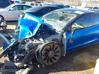 2022 Tesla Model 3 Performance z VIN 5YJ3E1EC9NF337945, wystawiony jako IAAI lot #41419561 z przebiegiem Nie podano mil oraz . Historia ofert i sprzedaży dostępna na DreamBid. Obrazek 6.