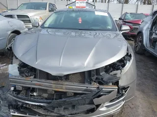 2015 Lincoln MKZ z VIN 3LN6L2JK4FR610596, wystawiony jako IAAI lot #41443285 z przebiegiem 114 363 mil mil oraz . Historia ofert i sprzedaży dostępna na DreamBid. Obrazek 12.