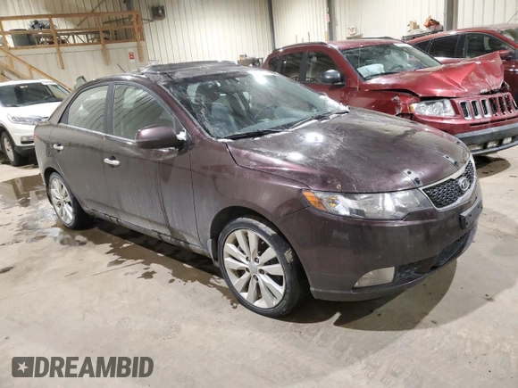 2011 Kia Forte SX with VIN KNAFW4A38B5364582, listed as a Copart auction lot 83054214 with 214,416 mi miles and Clean Title. Bid and sale history available at carsss.com. Image 4.