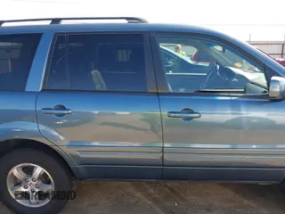 2007 Honda Pilot EX-L with VIN 5FNYF18517B028036, listed as a IAAI auction lot 41860675 with 61,217 mi miles and . Bid and sale history available at DreamBid. Image 14.