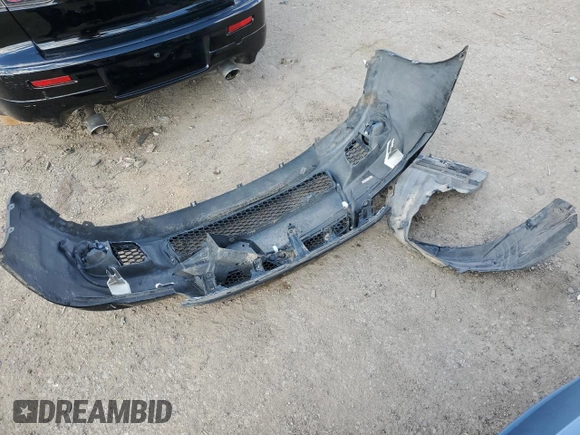 2009 Mitsubishi Lancer with VIN JA3AV66V39U039262, listed as a Copart auction lot 69342714 with 86,000 mi miles and Salvage Title. Bid and sale history available at DreamBid. Image 12.