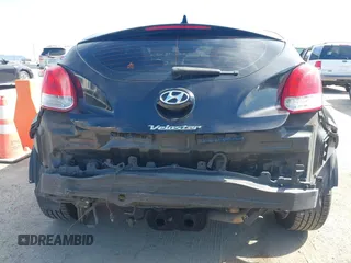 2013 Hyundai Veloster w/Black Int with VIN KMHTC6AD4DU132701, listed as a IAAI auction lot 42021759 with 102,840 mi miles and . Bid and sale history available at DreamBid. Image 6.
