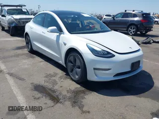 2020 Tesla Model 3 Standard Range Plus z VIN 5YJ3E1EA6LF659311, wystawiony jako IAAI lot #42363341 z przebiegiem 96 378 mil mil oraz . Historia ofert i sprzedaży dostępna na DreamBid. Obrazek 1.