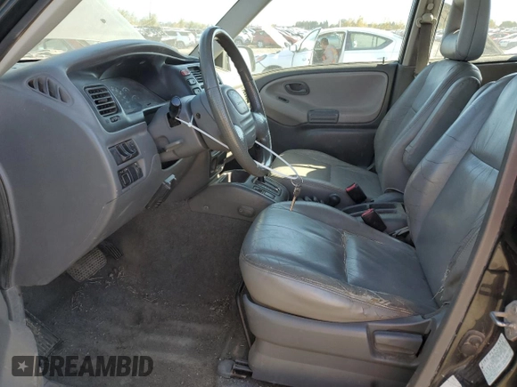 2002 Chevrolet Tracker ZR2 with VIN 2CNBJ734X26948098, listed as a Copart auction lot 73135754 with 234,627 mi miles and Salvage title. Bid and sale history available at DreamBid. Image 7.